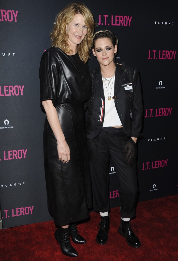 Laura Dern, towering in lace-up Louboutin ankle boots and a sleek black leather Derek Lam dress, poses beside a much shorter Kristen Stewart, who rocked a Thom Browne suit and Dr. Martens at the J.T. LeRoy premiere