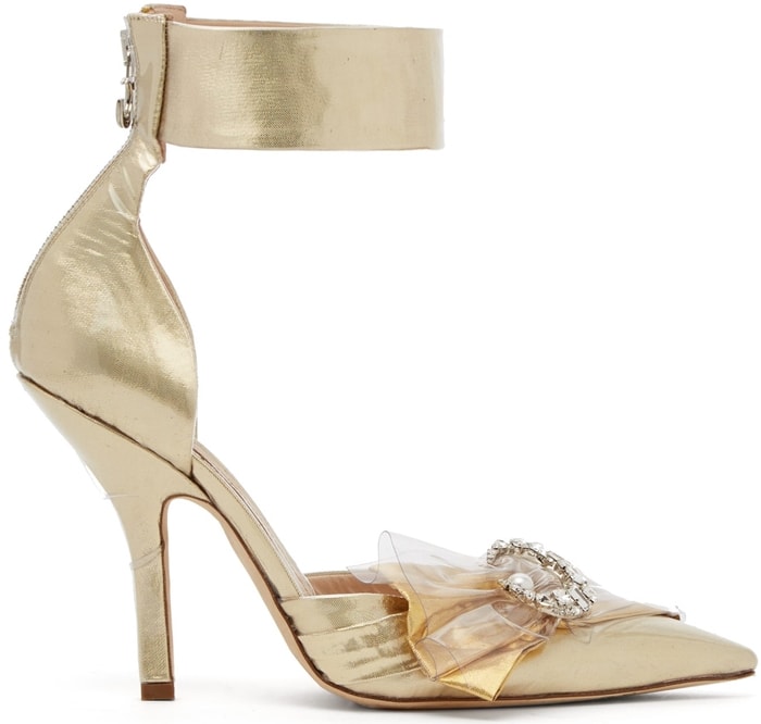 Gold lamé Midnight 00 pumps feature a pointed toe, sculptural ankle cuff, and the brand’s signature PVC-encased embellishment for a modern “glass slipper” finish