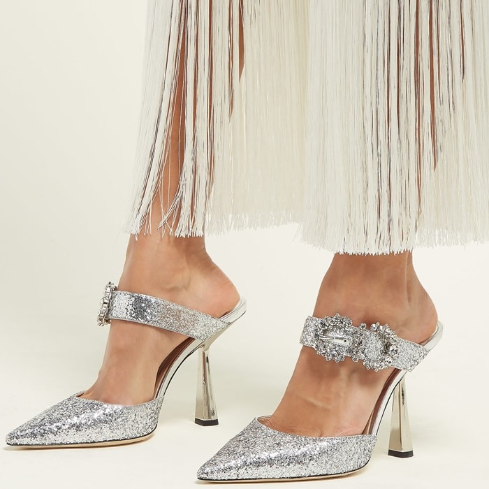Made in Italy, this pointy pair is decorated with glistening crystal buckles and lined with smooth leather for comfort