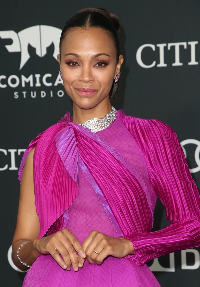 Zoe Saldaña in a magenta Givenchy Spring 2019 Haute Couture one-sleeve dress