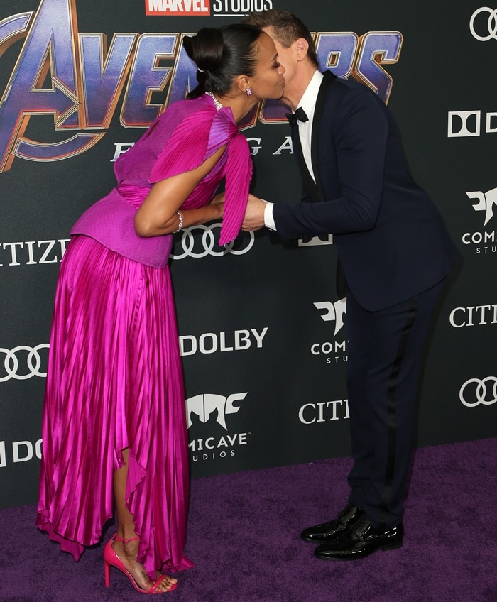 Zoe Saldaña gets a kiss from Jeremy Renner at the Avengers: Endgame premiere