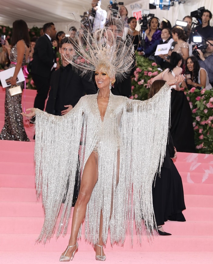 Celine Dion wears a glitzy performance mammoth headdress by Oscar de la Renta at the 2019 Met Gala