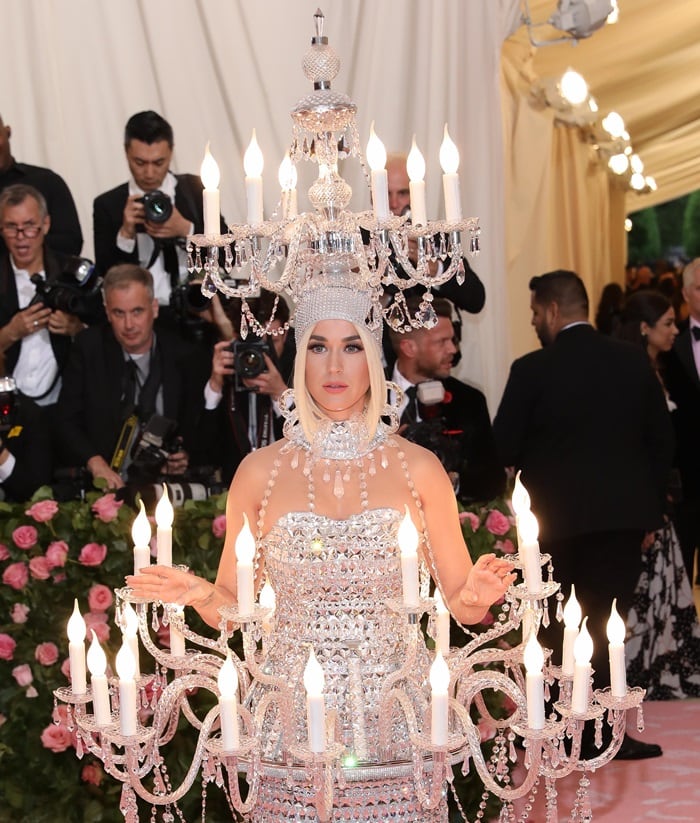 Katy Perry wears a candled chandelier dress at the 2019 Met Gala held at the Metropolitan Museum of Art in New York City