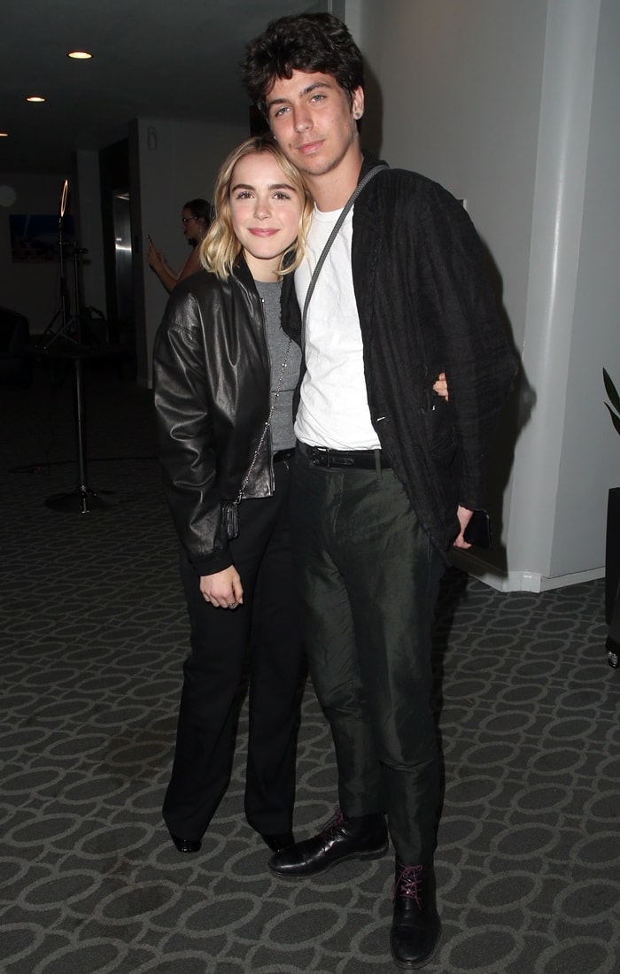 Kiernan Shipka keeps it understated in sleek black separates anchored by polished leather shoes, while Charlie Oldman complements her look in classic lace-ups at the Be Natural: The Untold Story of Alice Guy-Blaché premiere