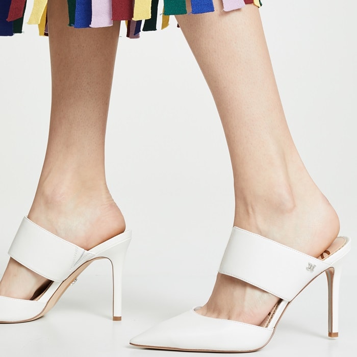 The bright-white Sam Edelman Hope pairs an opaque leather toe and instep strap with transparent sections that expose the sides of the foot