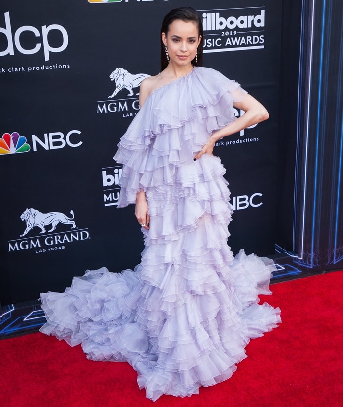 Sofia Carson waded through a sea of lavender ruffles in Giambattista Valli Haute Couture at the 2019 Billboard Music Awards in Las Vegas