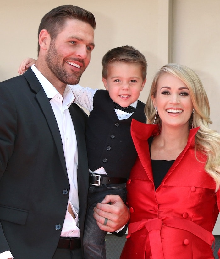 Carrie Underwood with Mike Fisher and their son Isaiah as she received her star on the Hollywood Walk of Fame