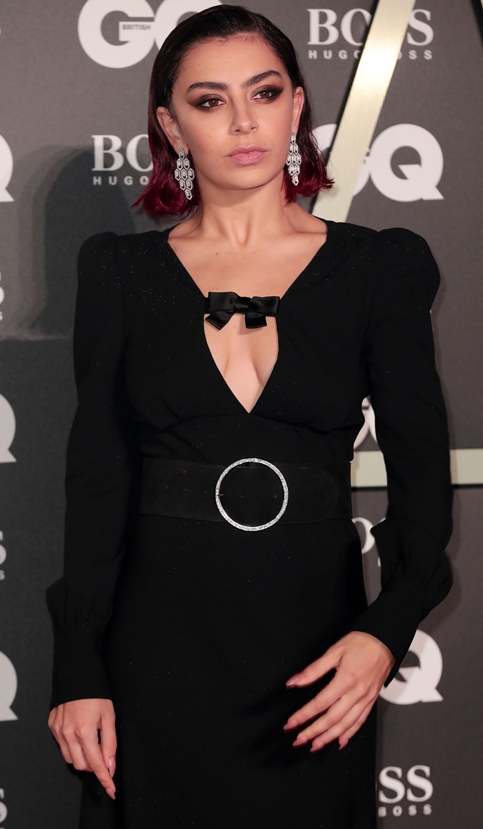 Charli XCX in a bow-embellished stretch-wool shift maxi dress from Alessandra Rich