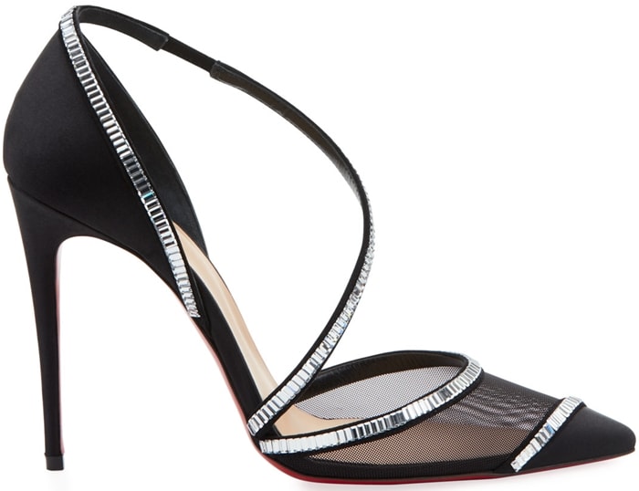 The black suede version of Christian Louboutin’s Chiara pumps pairs sheer mesh panels with crystal-lined straps for a sharper, more evening-ready take on the silhouette