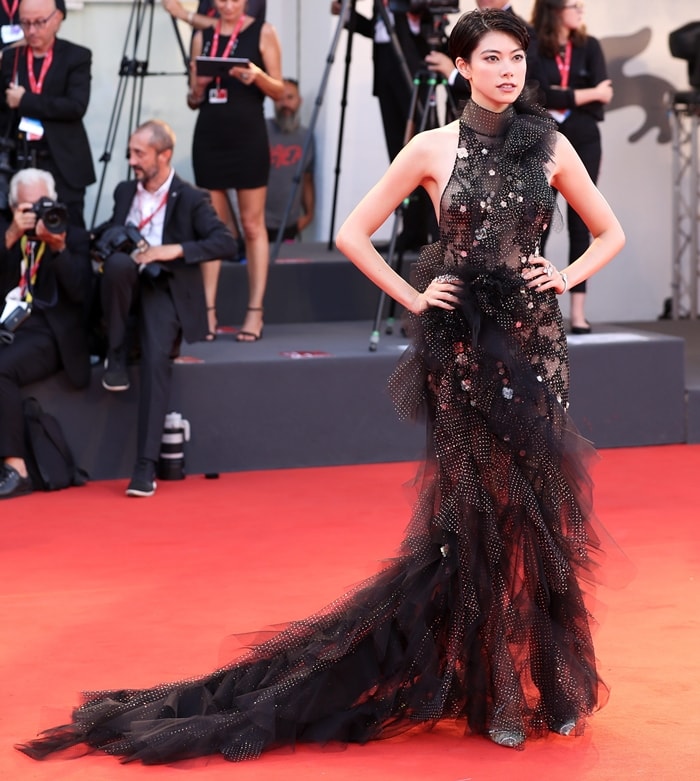 Hikari Mori paired Christian Louboutin’s crystal-embellished Chiara pumps with a dramatic black Ralph Russo Couture gown at the premiere of Joker during the 2019 Venice Film Festival in Venice, Italy, on August 31, 2019