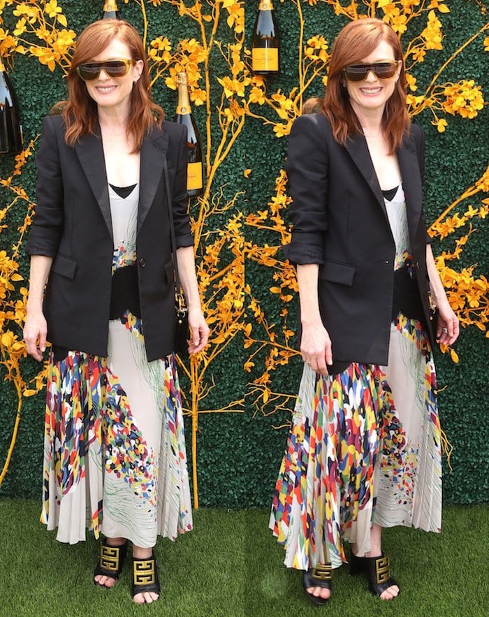 Smiling on the grass, she revealed her bold black Givenchy logo mules beneath the flowing printed skirt, balancing polish with event-ready practicality at the 12th Annual Veuve Clicquot Polo Classic