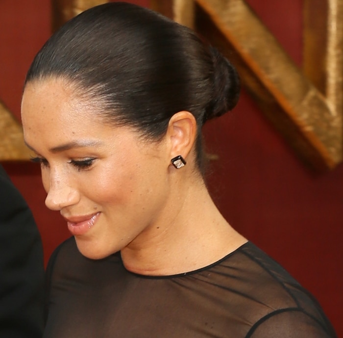 Meghan Markle wears Nikos Koulis diamond and black enamel earrings with her Jason Wu dress