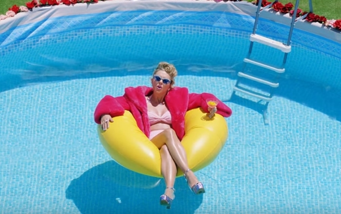 Taylor Swift pairs Giuseppe Zanotti Lavinia platform sandals with a Norma Kamali bikini and Vivetta faux-fur jacket