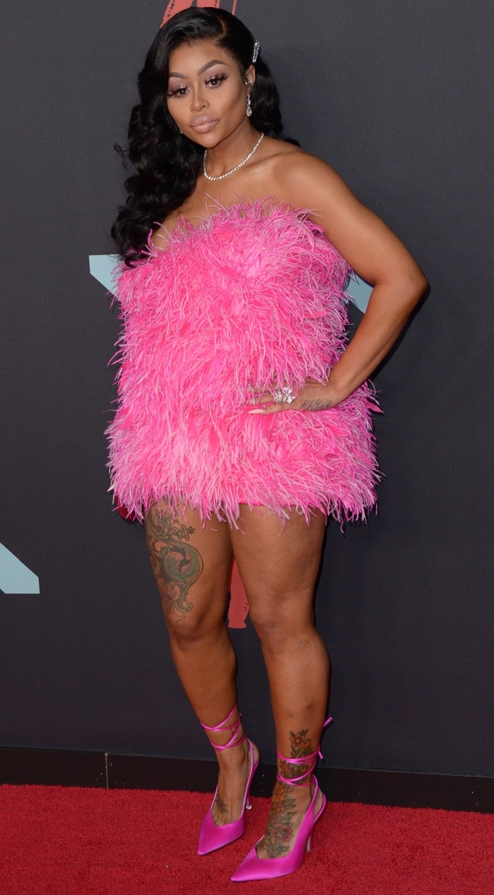 Blac Chyna wears a pink Attico feather mini dress and matching Venus satin pumps at the 2019 MTV VMAs