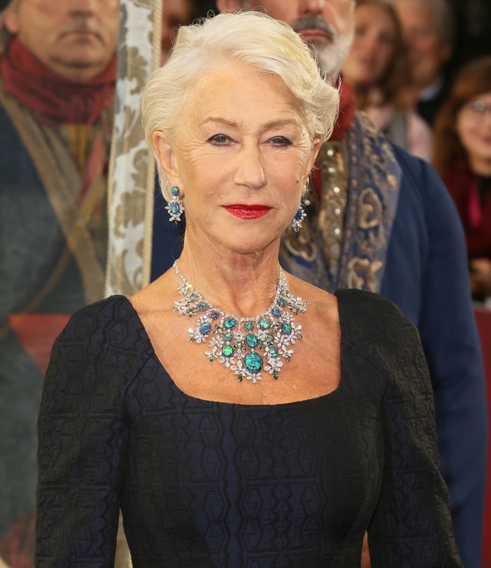 Helen Mirren elevated her understated Chalayan look with an intricate Chopard necklace set featuring vivid blue and green gemstones