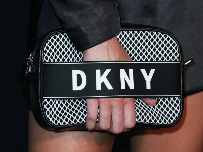 Kendall Jenner carried an ebony mesh camera bag with a sporty shell and a spacious, pocket-lined interior