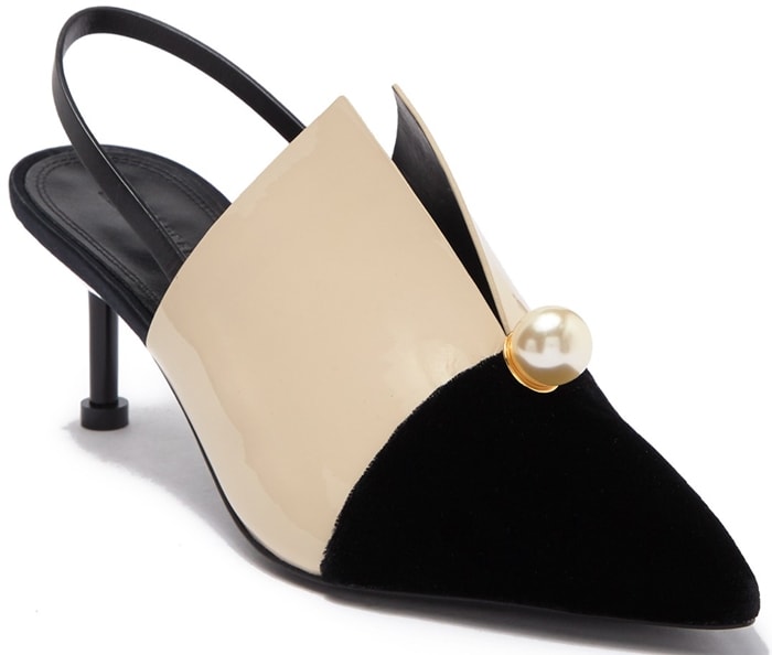 Mercedes Castillo "Violah" slingback pumps combined a pointed black velvet toe with a sculptural cream leather vamp, finished by a faux pearl accent and an architectural kitten heel that made the design one of the brand's most distinctive—and divisive—2019 creations