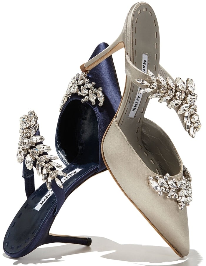 The Manolo Blahnik Lurum combines a pointed-toe satin mule with the brand's signature crystal-encrusted vine, creating one of its most recognizable modern evening shoe designs