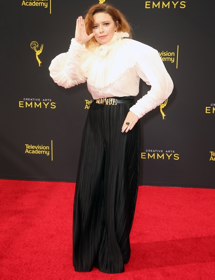 Natasha Lyonne embraces Rodarte's dramatic proportions, wearing a voluminous blouse and wide-leg trousers at the Emmy Awards