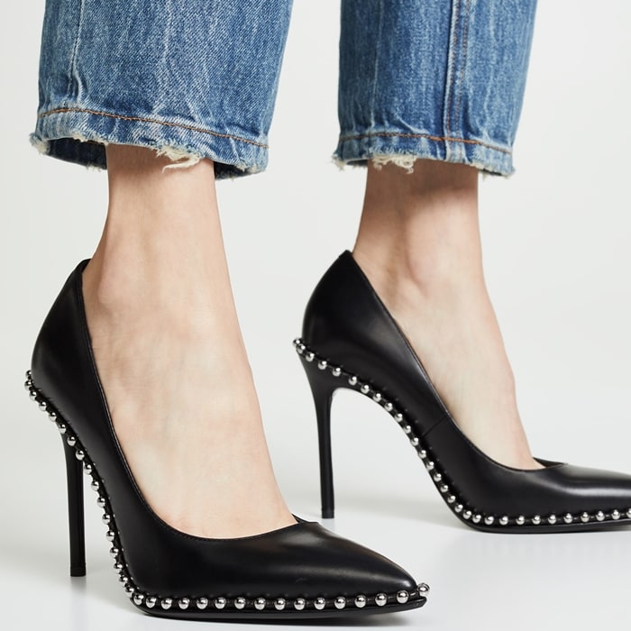 Silvery ball studs—an edgy detail seen in Alexander Wang's ready-to-wear collections—highlight the sharply pointed toe of this ultra-versatile stiletto