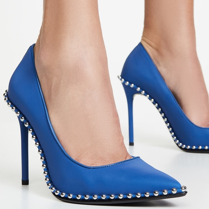 Silvery ball studs—an edgy detail seen in Alexander Wang's ready-to-wear collections—highlight the sharply pointed toe of this ultra-versatile stiletto
