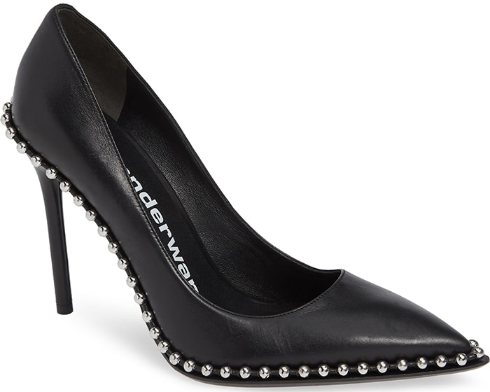 Silvery ball studs—an edgy detail seen in Alexander Wang's ready-to-wear collections—highlight the sharply pointed toe of this ultra-versatile stiletto