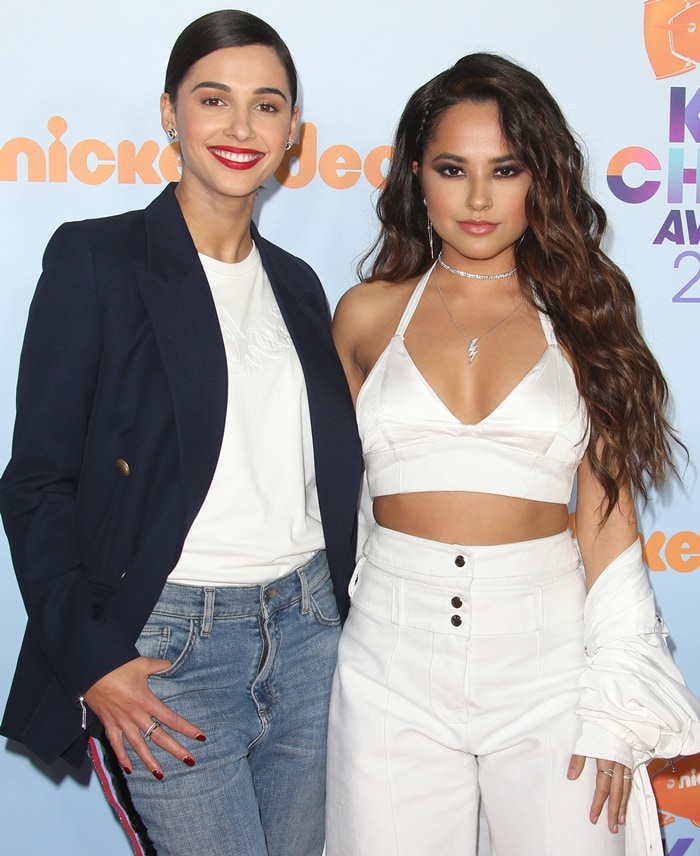 Naomi Scott (left) and Becky G pose together at Nickelodeon’s 2017 Kids’ Choice Awards at the USC Galen Center in Los Angeles on March 11, 2017, blending tailored polish with relaxed, modern separates
