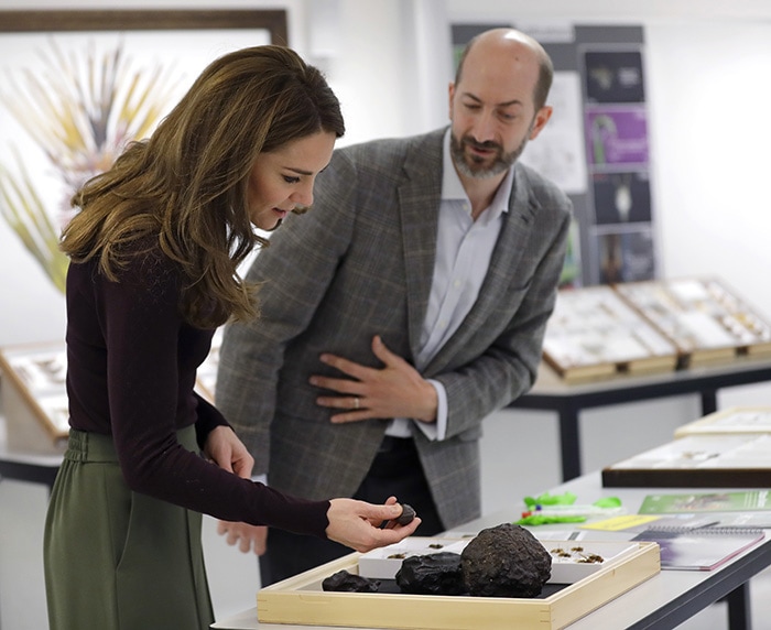 Catherine, Duchess of Cambridge, with the head of the Angela Marmont Centre, Dr. John Tweddle