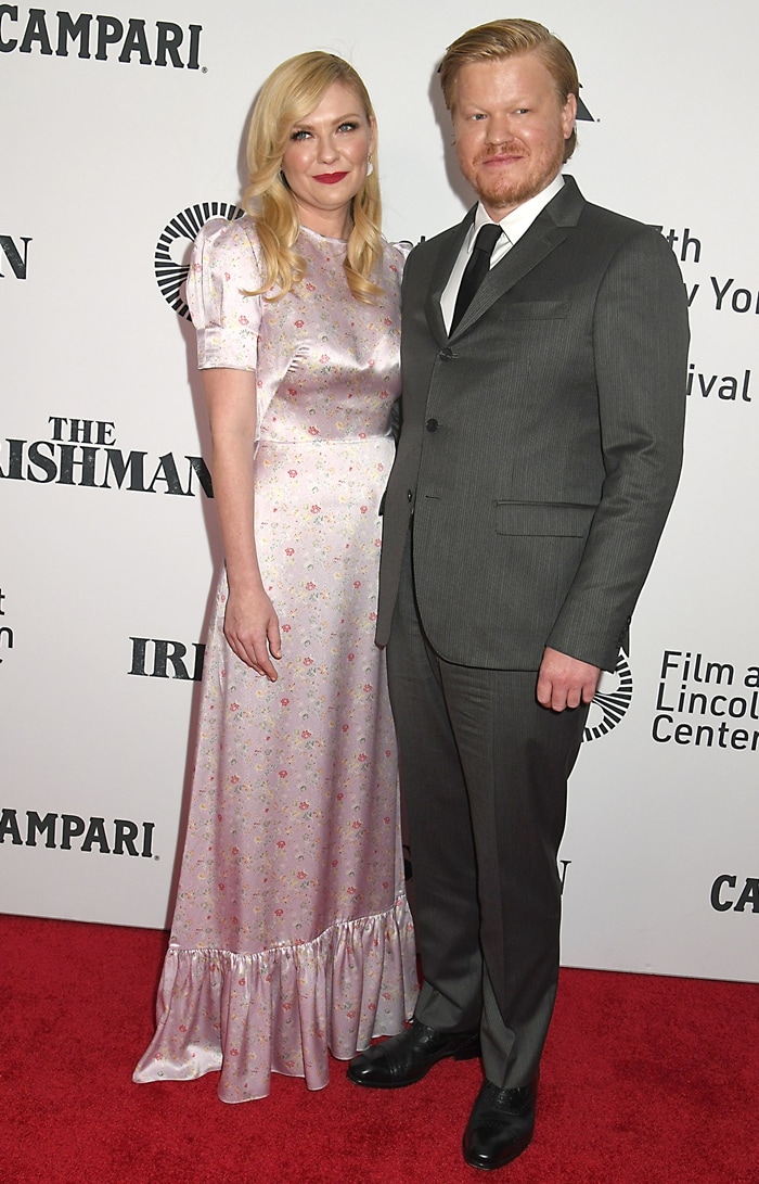 Kirsten Dunst softens the red carpet in a delicate floral gown, while Jesse Plemons grounds the look in a sharply tailored gray suit and polished black dress shoes at The Irishman premiere during the 2019 New York Film Festival