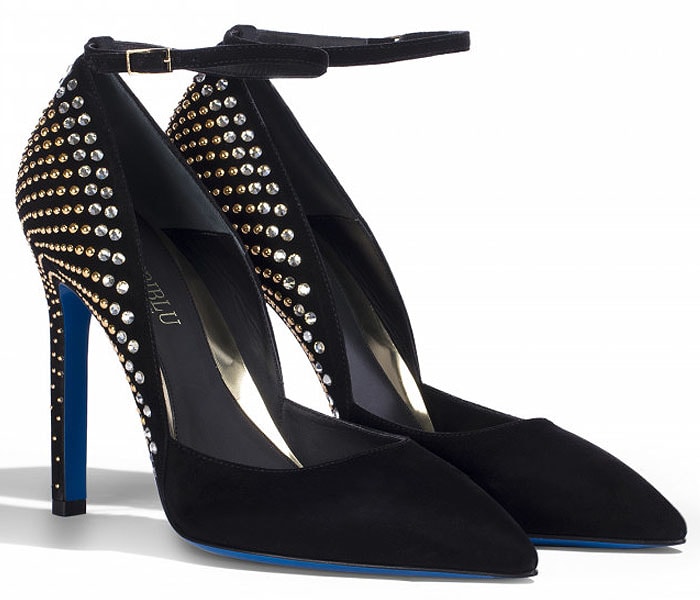 Close-up of Loriblu's black suede ankle-strap pumps, distinguished by crystal-embellished heel counters, the brand's signature cobalt-blue soles, and slim stiletto heels