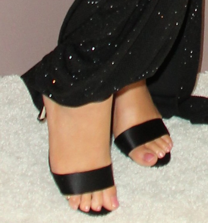 Mariah Carey shows off her feet in open-toe sandals