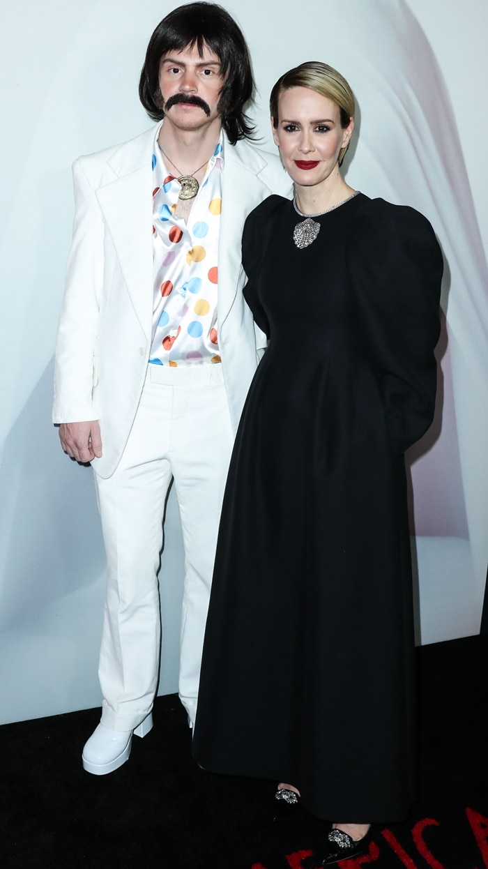 Actor Evan Peters, who was dressed as Sonny from the “Sonny and Cher Comedy Hour”, and actress Sarah Paulson arrive at FX's 'American Horror Story' 100th Episode Celebration held at the Hollywood Forever Cemetery