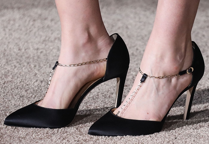 Krysten Ritter shows off her feet in chain-link T-strap pumps by Chloe Gosselin
