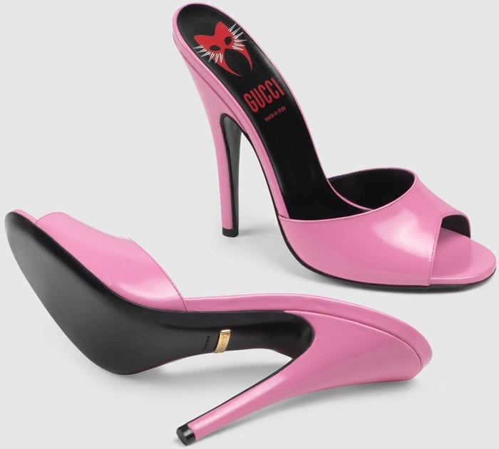 These pink leather slip-on stiletto sandals feature a slip-on style, an almond toe, an open toe, a high stiletto heel, a branded insole, and a leather insole