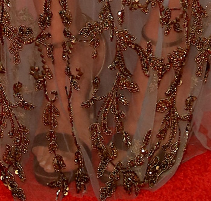 Carrie Underwood complements her Elie Madi embellished gown with Jimmy Choo sandals