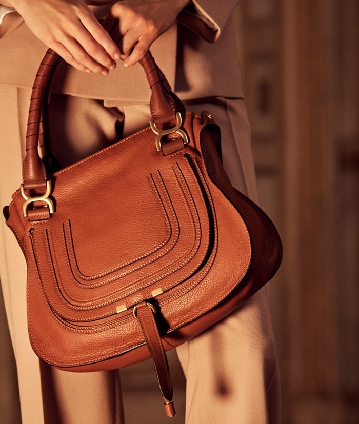 Chloé's iconic Marcie round saddle mini bag in small grain calfskin