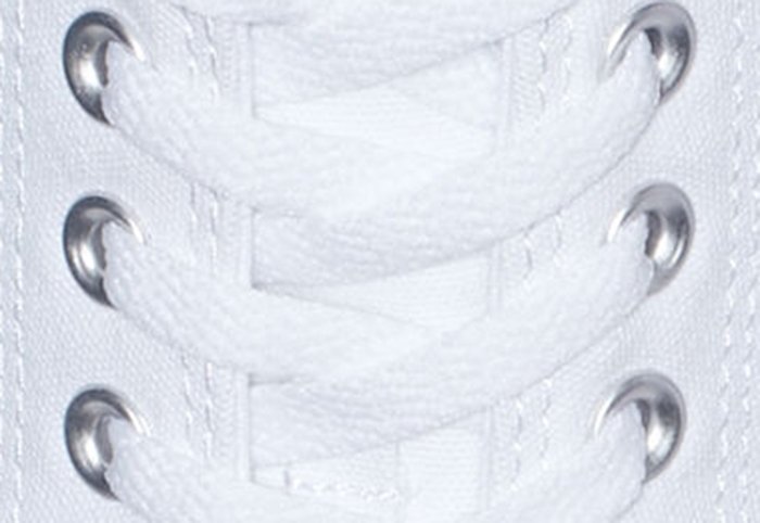 Authentic Converse Chuck Taylor All Star sneakers featuring neatly aligned matte metal eyelets and clean stitching