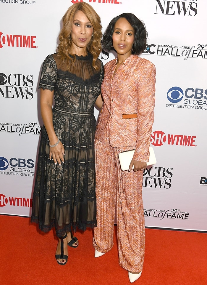 Kerry Washington paired a chevron-print Missoni knit suit with white Jimmy Choo Erin slingback pumps and a matching Ellipse clutch, while Channing Dungey complemented her in a sheer black lace midi dress and black ankle-strap sandals