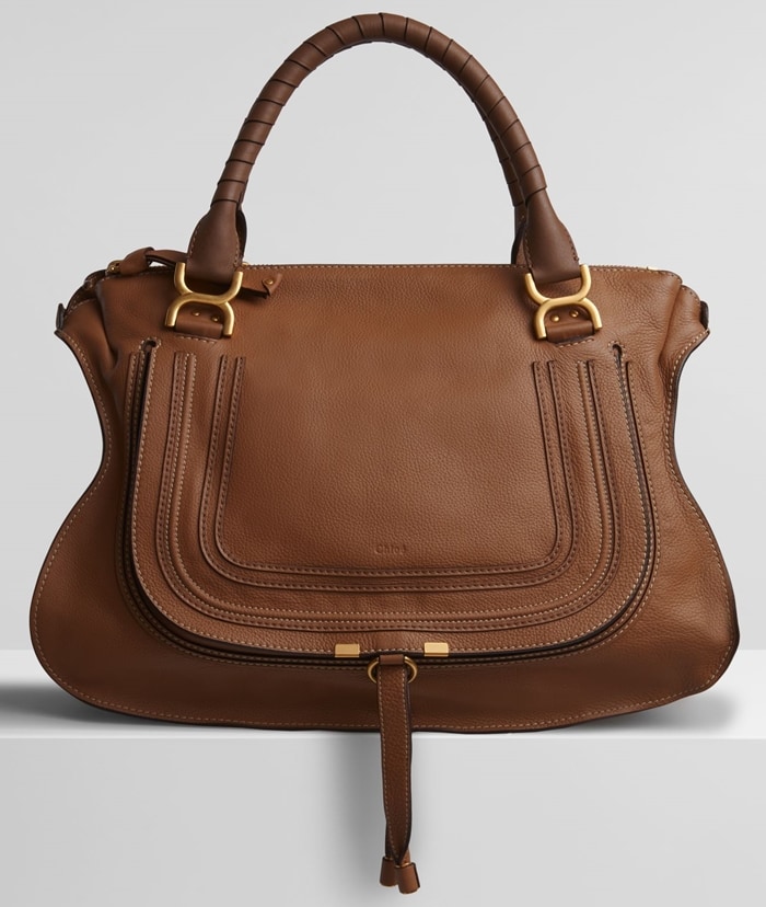 there's usually no brand marking (neither Chloé nor a zipper brand like YKK) on the zipper itself. All zippers on a Chloé bag should operate smoothly and align perfectly