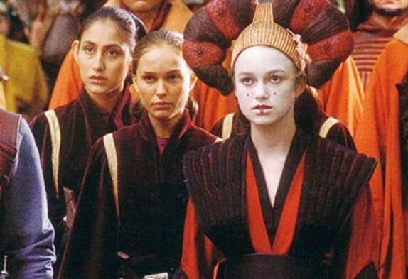 A 12-year-old Keira Knightley appears as Sabé, Queen Amidala’s decoy to Natalie Portman’s Padmé, in Star Wars: Episode I – The Phantom Menace—a casting choice that played on their near-identical features