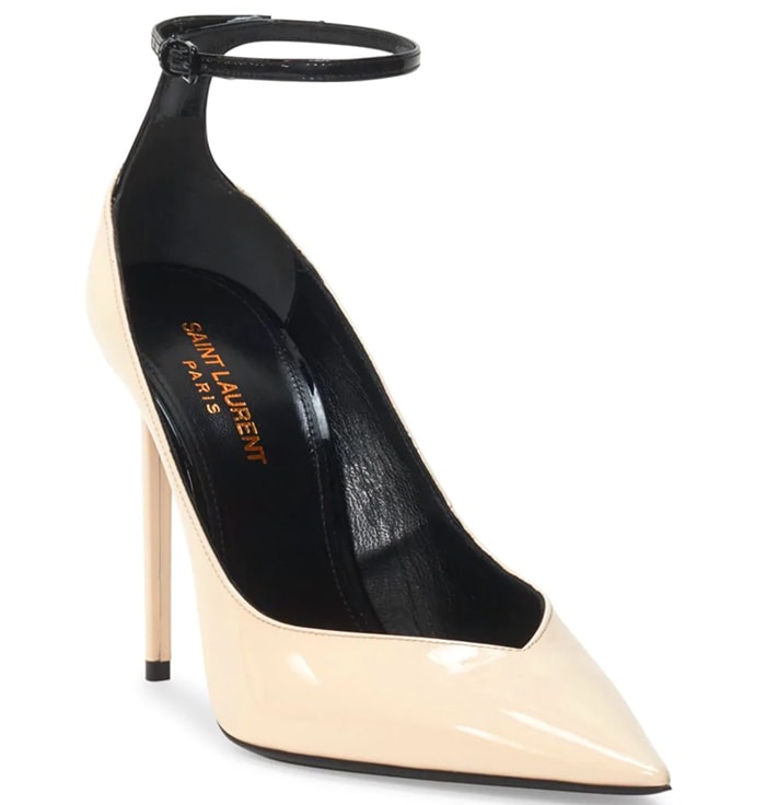 A product shot highlights the Saint Laurent “Zoe” pump’s notched pointed toe, glossy finish, and slender ankle strap