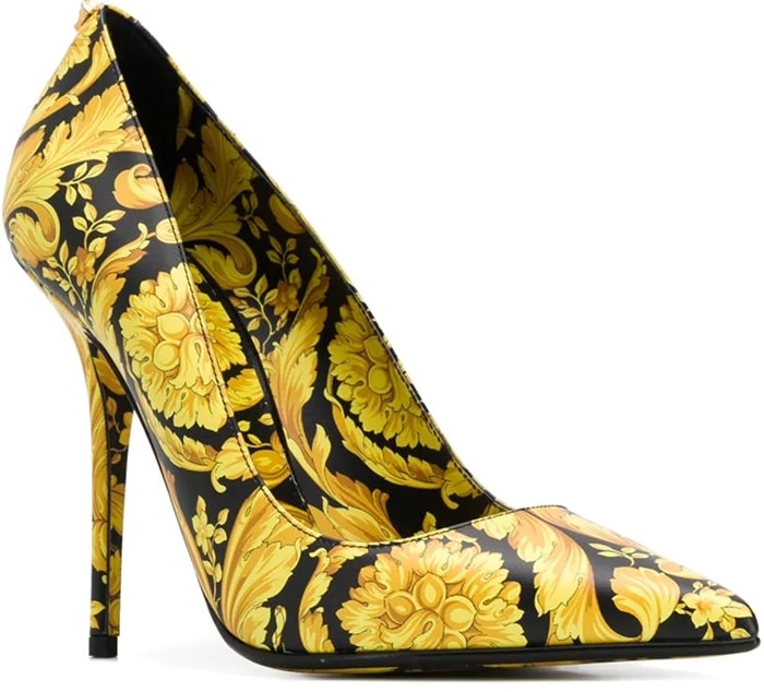 The Versace Barocco pumps reinterpret Gianni Versace’s famous Fall 1991 print in a sharply pointed silhouette with towering stiletto heels