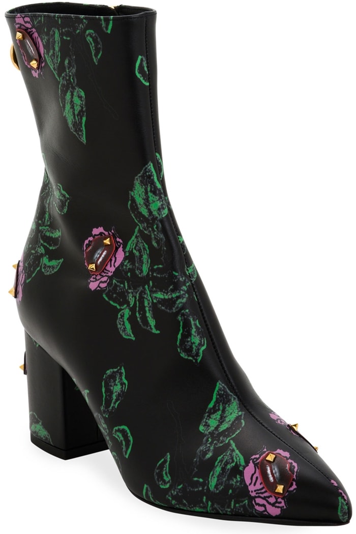 Floral motifs, jewel-like accents, and signature studs decorate this colorful Valentino Ringstud Undercover bootie