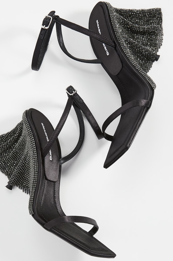 These strappy Blake sandals have an open square toe and dazzling crystals blanketing the heel