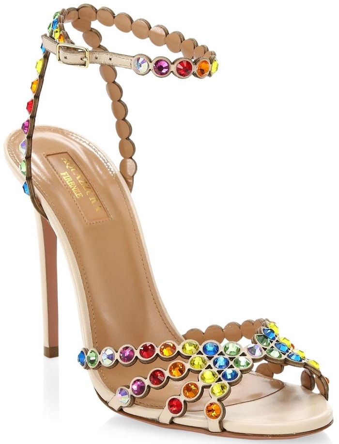 Rainbow crystal-embellished Aquazzura Tequila sandals bring a playful burst of color to the brand’s signature scalloped straps, combining barely-there elegance with disco-inspired sparkle