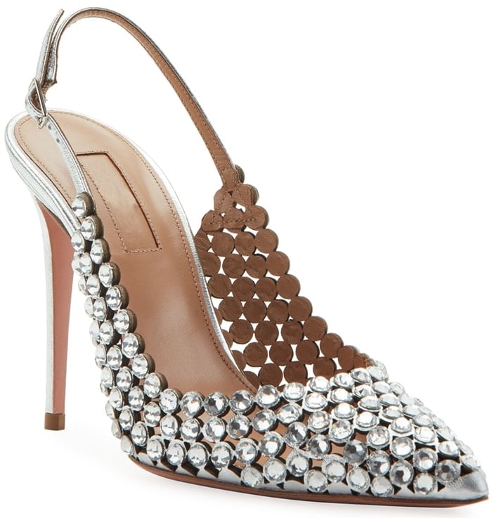 Silver crystal-covered Aquazzura slingback pumps combine mirror-like embellishment with a sharply pointed toe and delicate lattice-inspired side panels for a dramatic evening-shoe silhouette