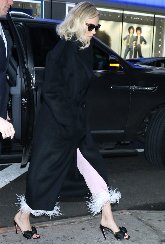 Outside Good Morning America in New York City, Brie Larson paired Sleeper's blush feather-trimmed separates with Zanotti's statement bow mules, creating one of the most memorable fashion moments of the Just Mercy press tour