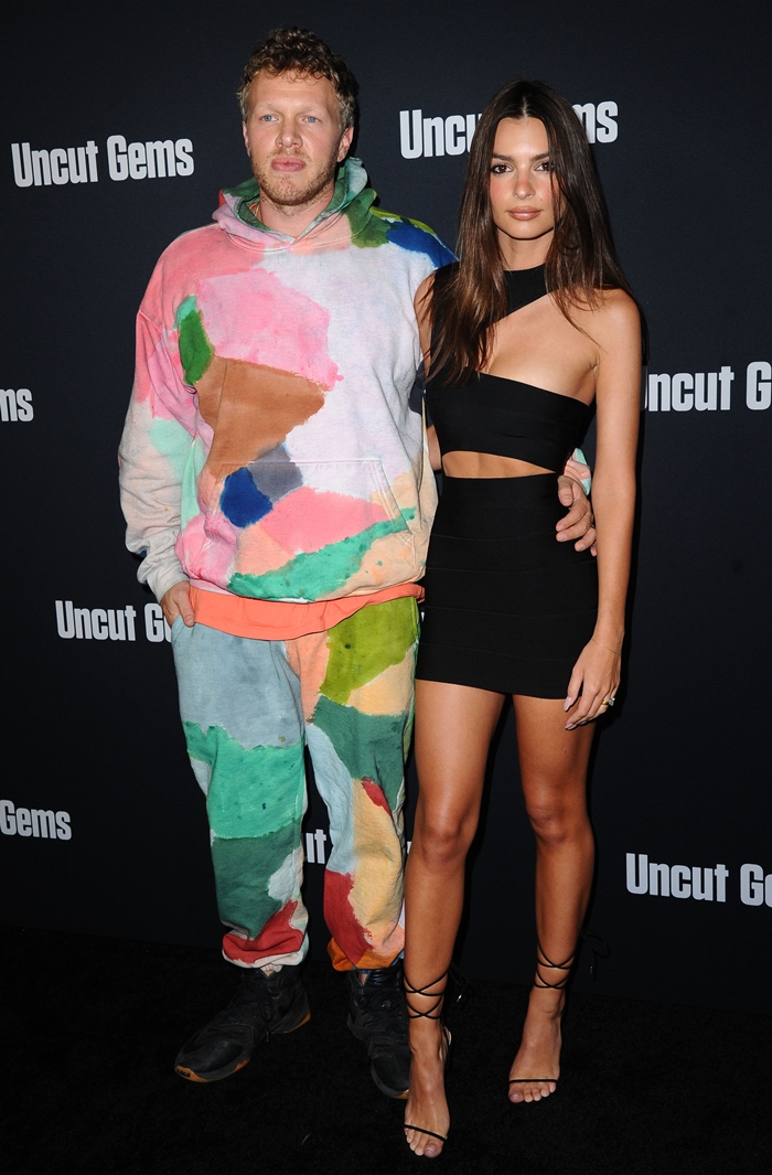 Producer Sebastian Bear-McClard attended the Uncut Gems premiere with his then-wife, Emily Ratajkowski, whose black Hervé Léger cutout mini dress and Merah Vodianova Ophelia lace-up sandals became one of her most recognizable late-2010s red carpet looks