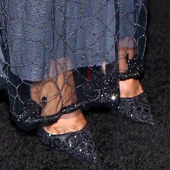 A closer look at Jennifer Hudson's Christian Louboutin Top Vague pumps reveals the intricate crystal embellishments, scalloped detailing, and sheer mesh construction that made the discontinued style one of the brand's most collectible evening shoes