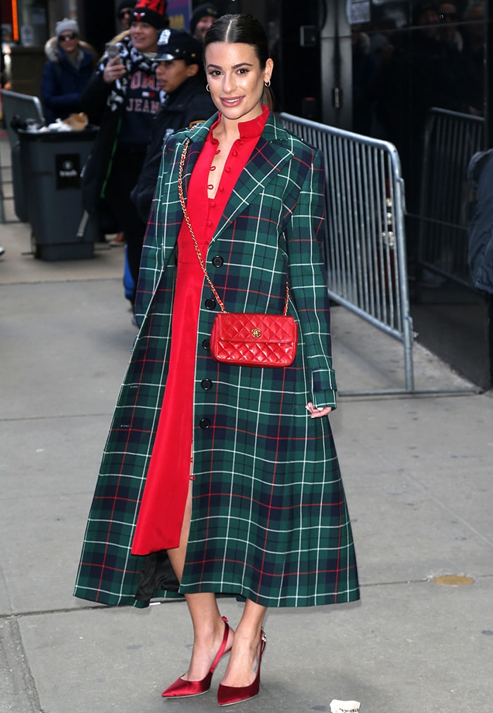 Lea Michele promotes her new album in a Novis red dress and Duncan tartan coat on December 5, 2019